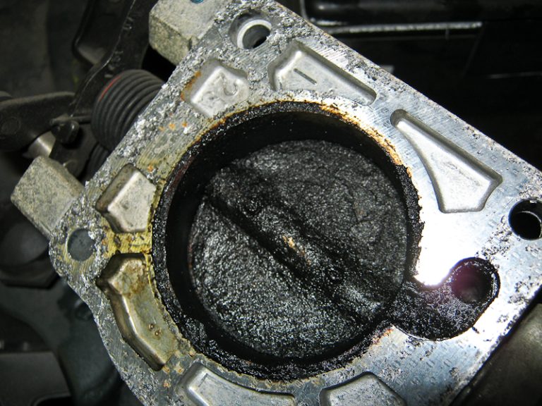 How to clean the throttle plate and why is it necessary?